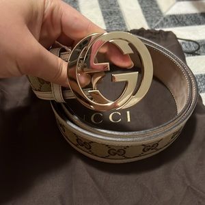 Gucci large buckle leather/canvas monogram belt.